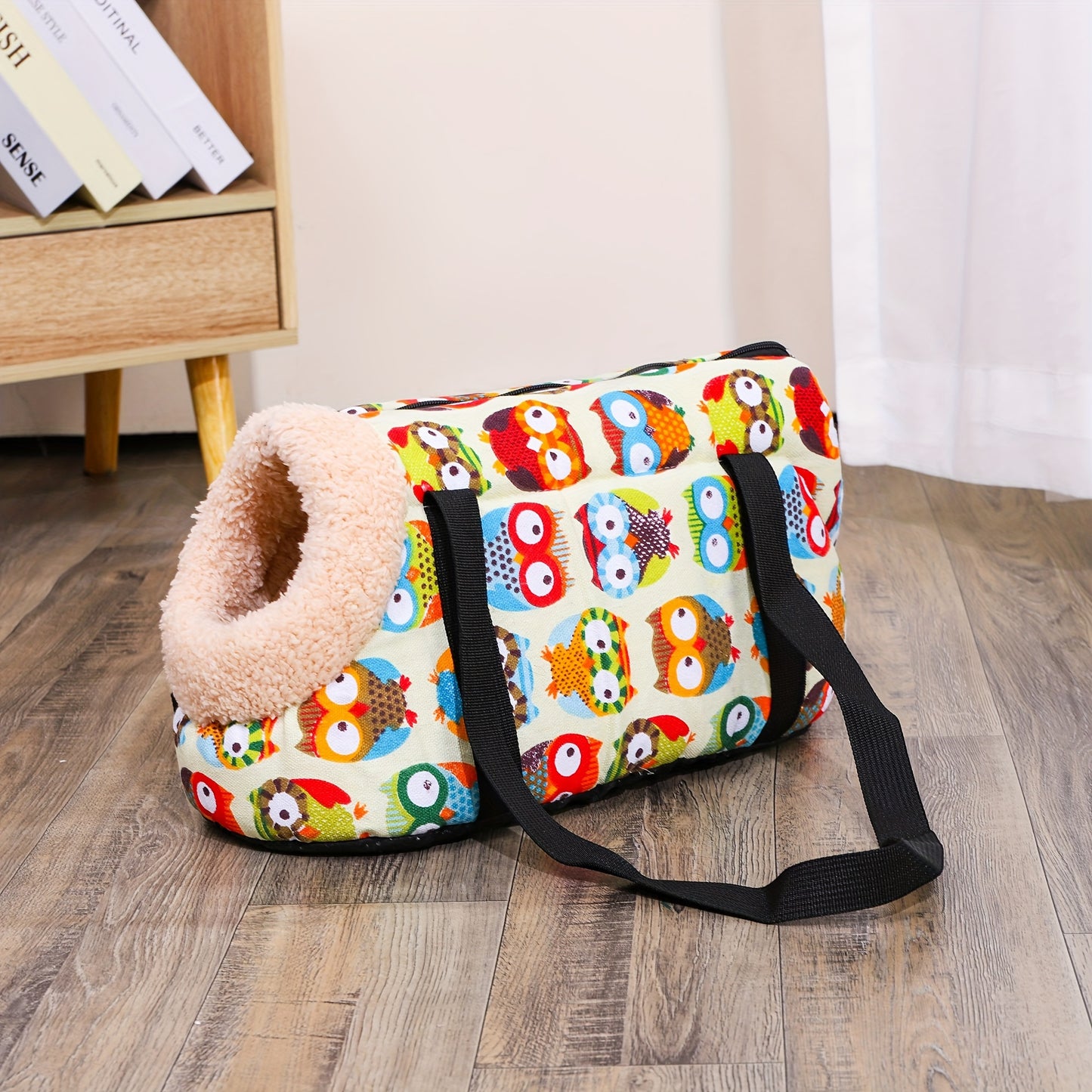 Washable, portable cat carrier bag in multi-colored design, perfect for small to medium cats. Features zippered closure and disassembled for easy litter outings.