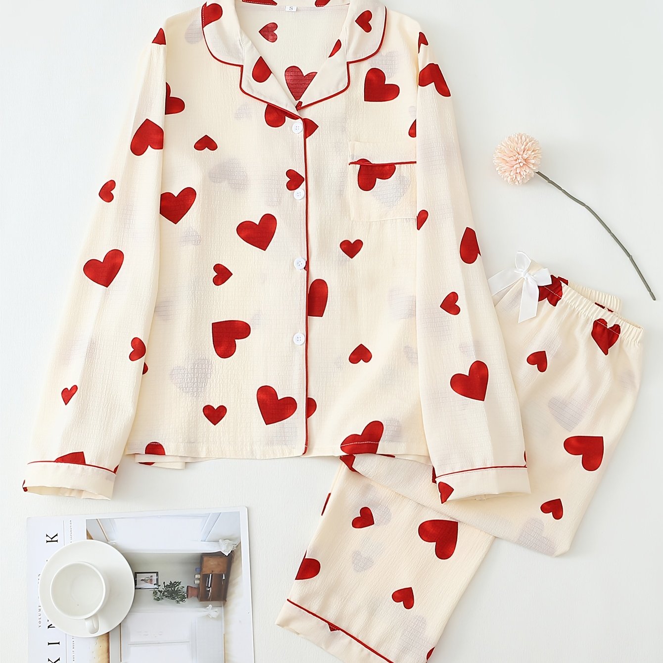 Teen pajama set with heart print, machine washable polyester blend, long sleeve top and pants.