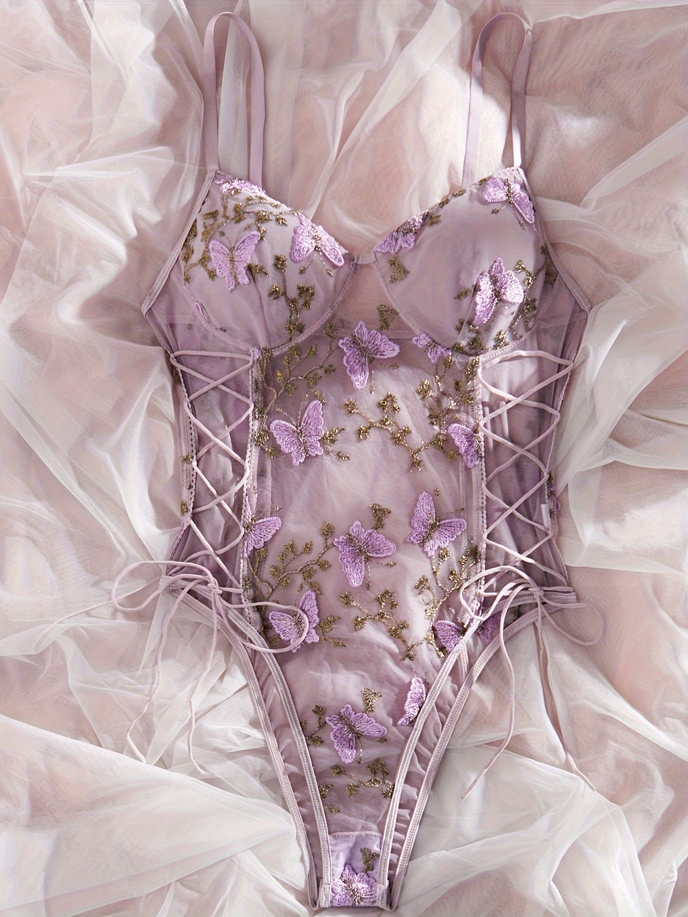 Purple butterfly embroidered teddy bodysuit with deep V-back, thong bottom, sheer mesh, hand washable, for women.