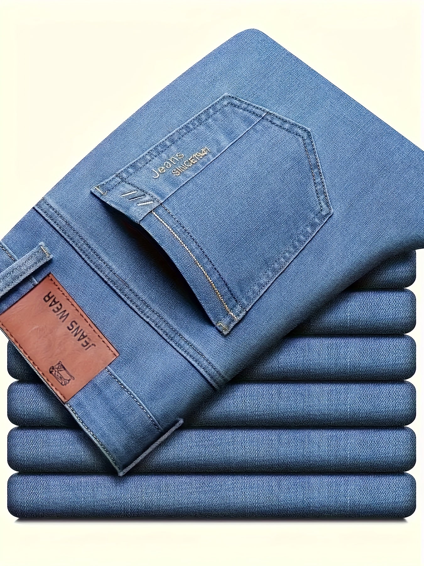 Casual solid denim pants for men with pockets, made from a cotton blend for outdoor activities.