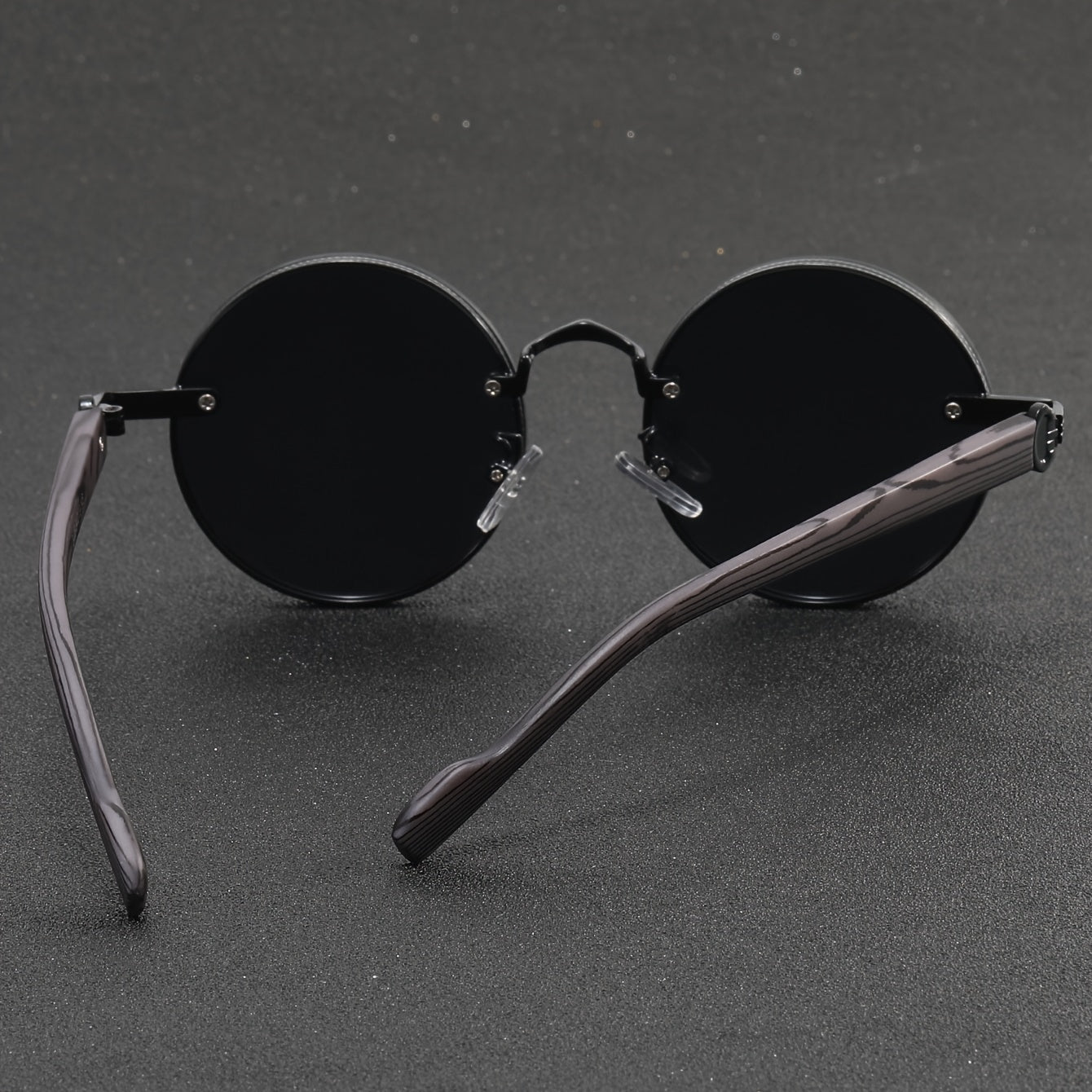 Small round frame retro glasses with wooden legs, all black - perfect for traveling.