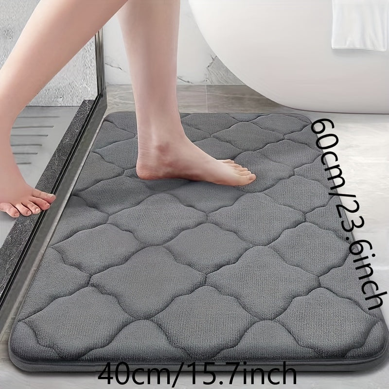 Soft plush bathroom mat with non-slip, absorbent, and machine washable features. Made of cozy coral fleece with a cute short pile design for a comfortable toilet experience.