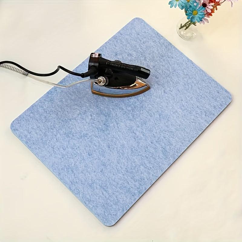 1 piece of Heat Resistant Felt Ironing Pad perfect for Quilting and Sewing Projects, featuring a durable non-slip Clothes Steam Board that is Easy to Iron on. A must-have for apartments, college dorms, and as a Home Office or Travel Accessory.