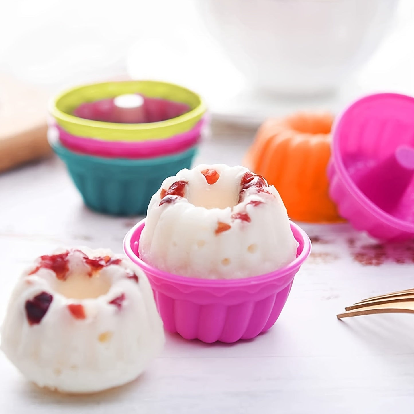 Get a dozen Mini Silicone Baking Cake Molds now! These nonstick cupcake liners are BPA-free and perfect for creating fancy desserts like jelly and muffins. Ideal for your baking needs.