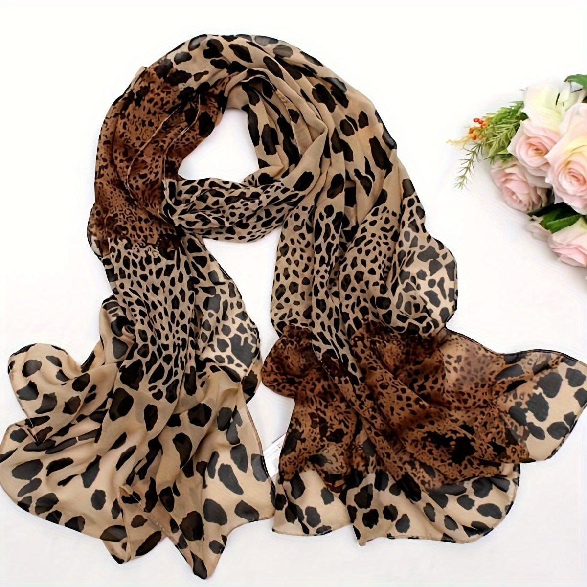 Women's boho style leopard print scarf made of 100% polyester chiffon, suitable for various occasions.