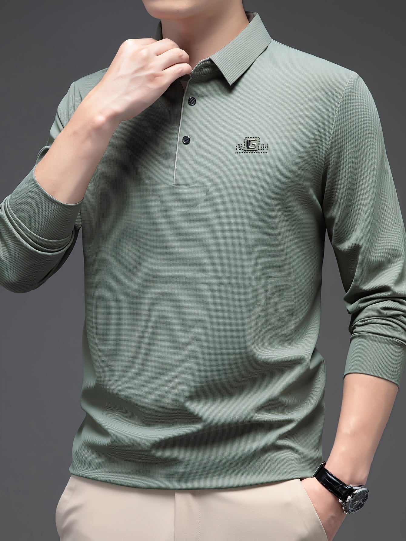 Men's lightweight long-sleeve shirt, ideal for golf and casual wear, made with breathable polyester blend.