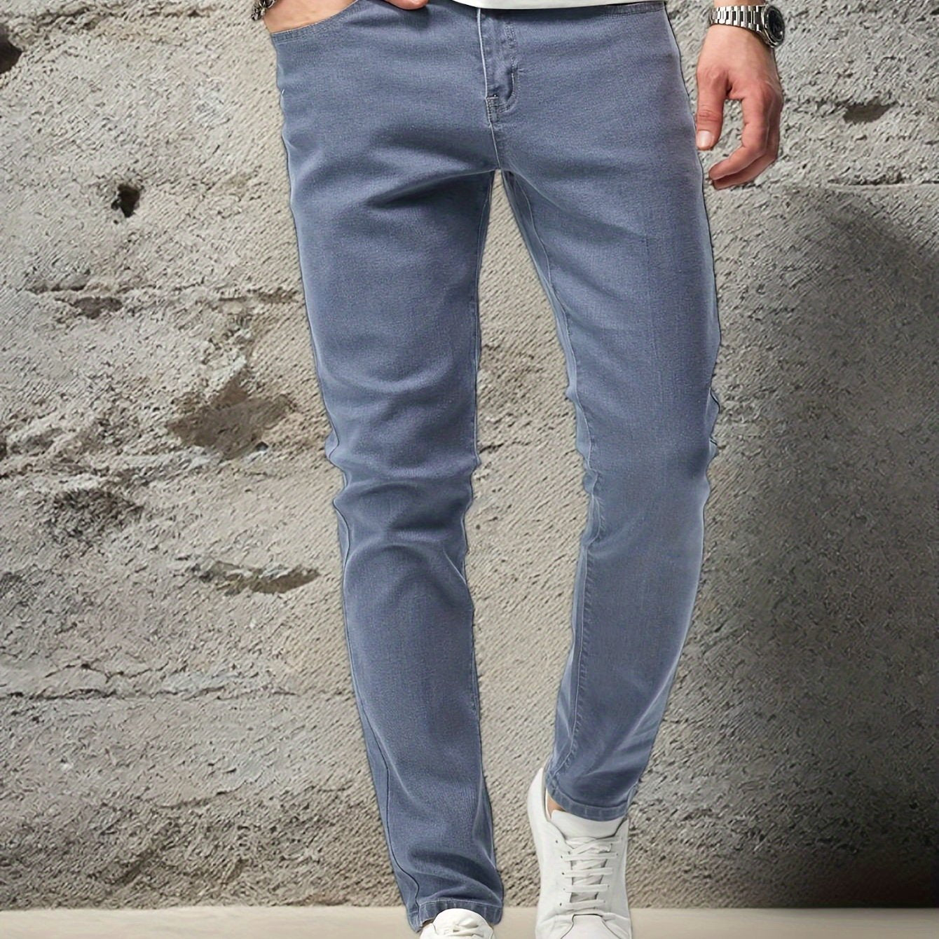 Stretchy denim jeans for men, ideal for casual outdoor wear.