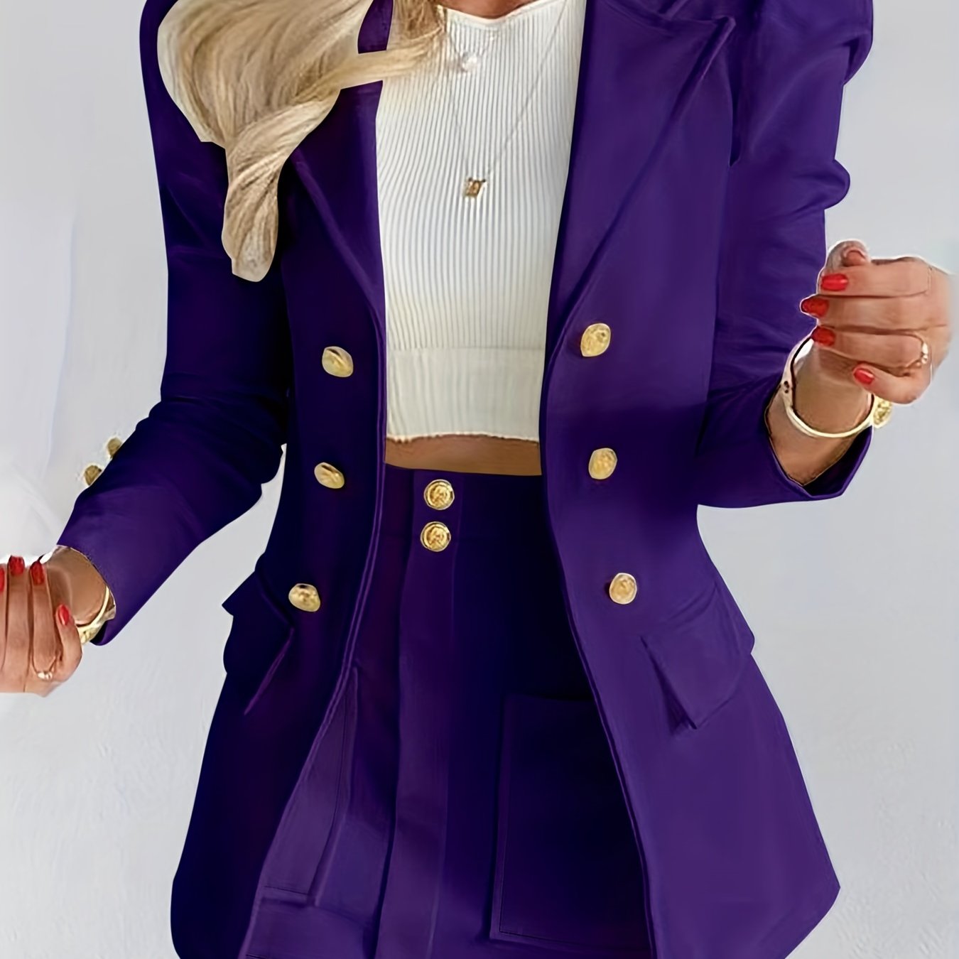 Elegant solid long sleeve blazer and mini skirt set for women.