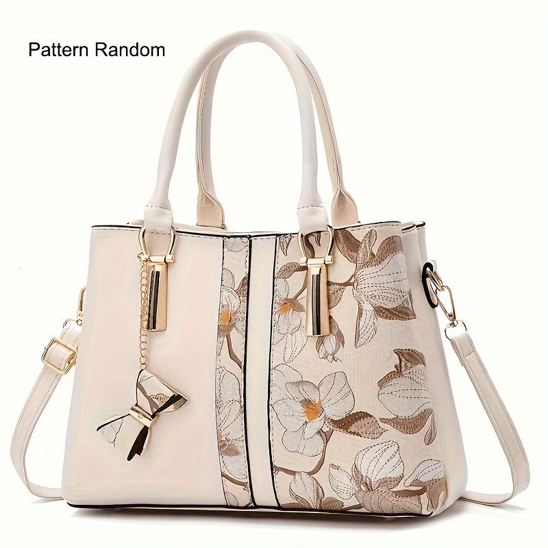 Chic floral print handbag with a spacious crossbody design.