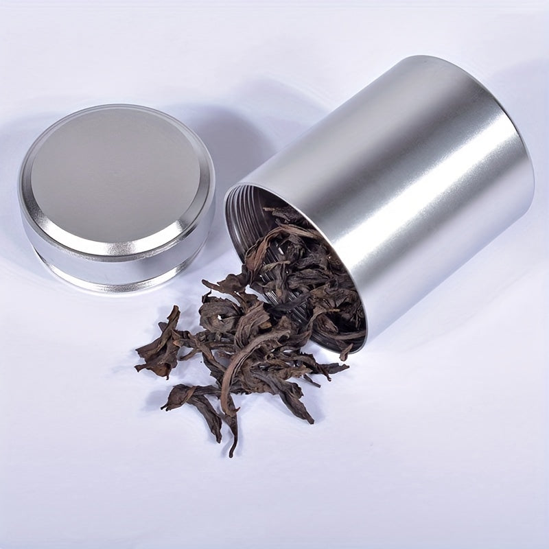 A compact stainless steel tea canister with sealed storage, ideal for on-the-go use. Packaged in a gift box, this household essential is perfect for storing tea on your travels.