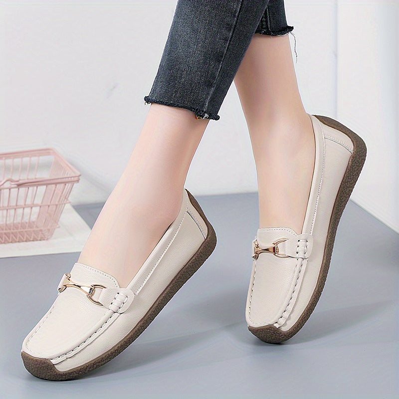 Women's metal decor slip on loafers for casual walking with non-slip flat soles.