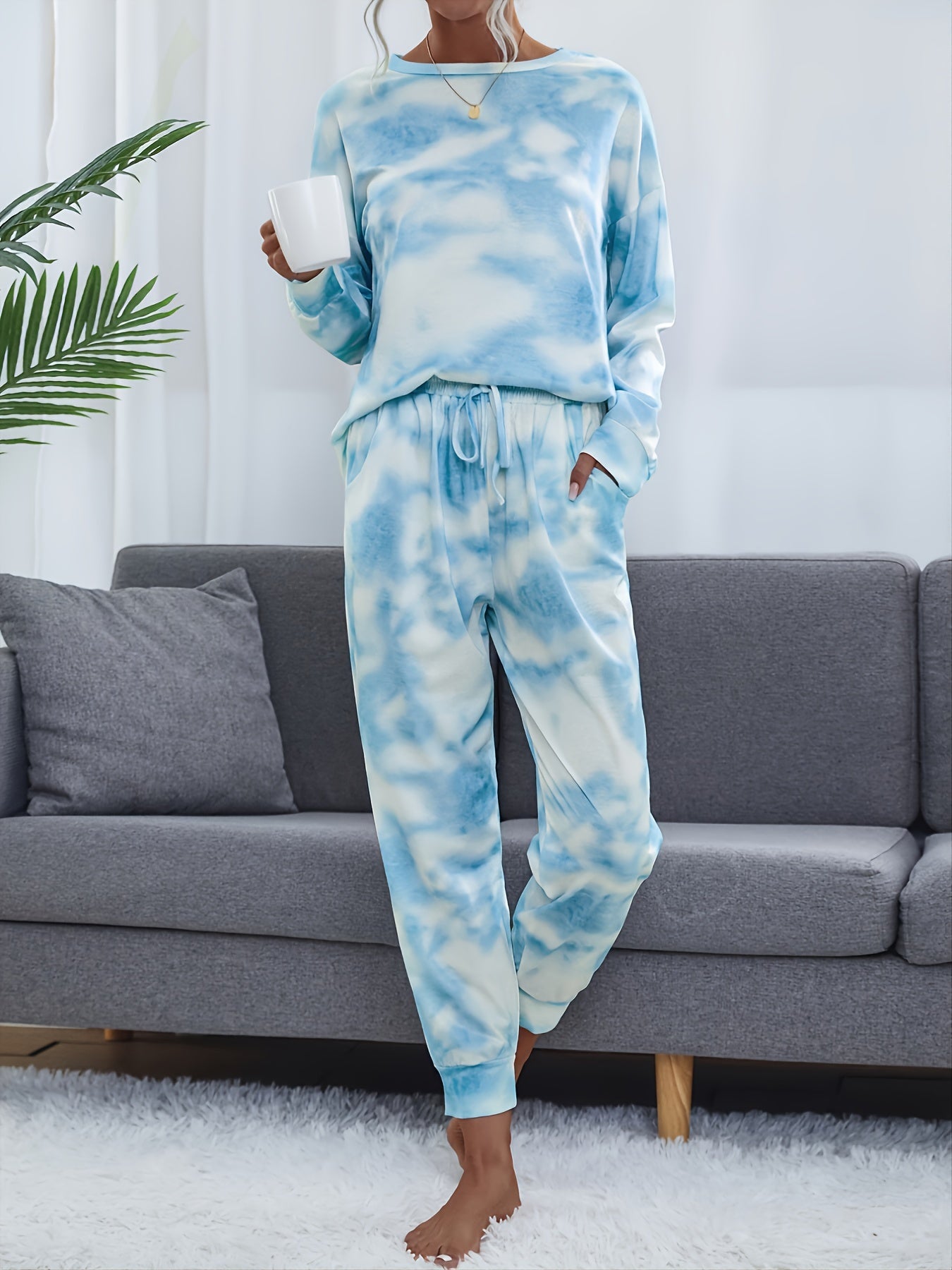 Tie dye lounge set for women, with long sleeve top and elastic waistband pants.