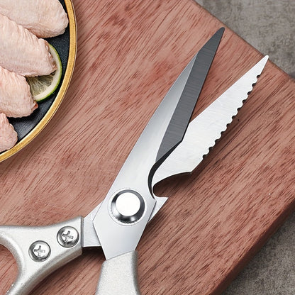 Sharp stainless steel kitchen scissors designed for home use, perfect for cutting through chicken, duck, and fish bones. Features a convenient fish scale scraper and is a helpful accessory for any small kitchen tool collection.