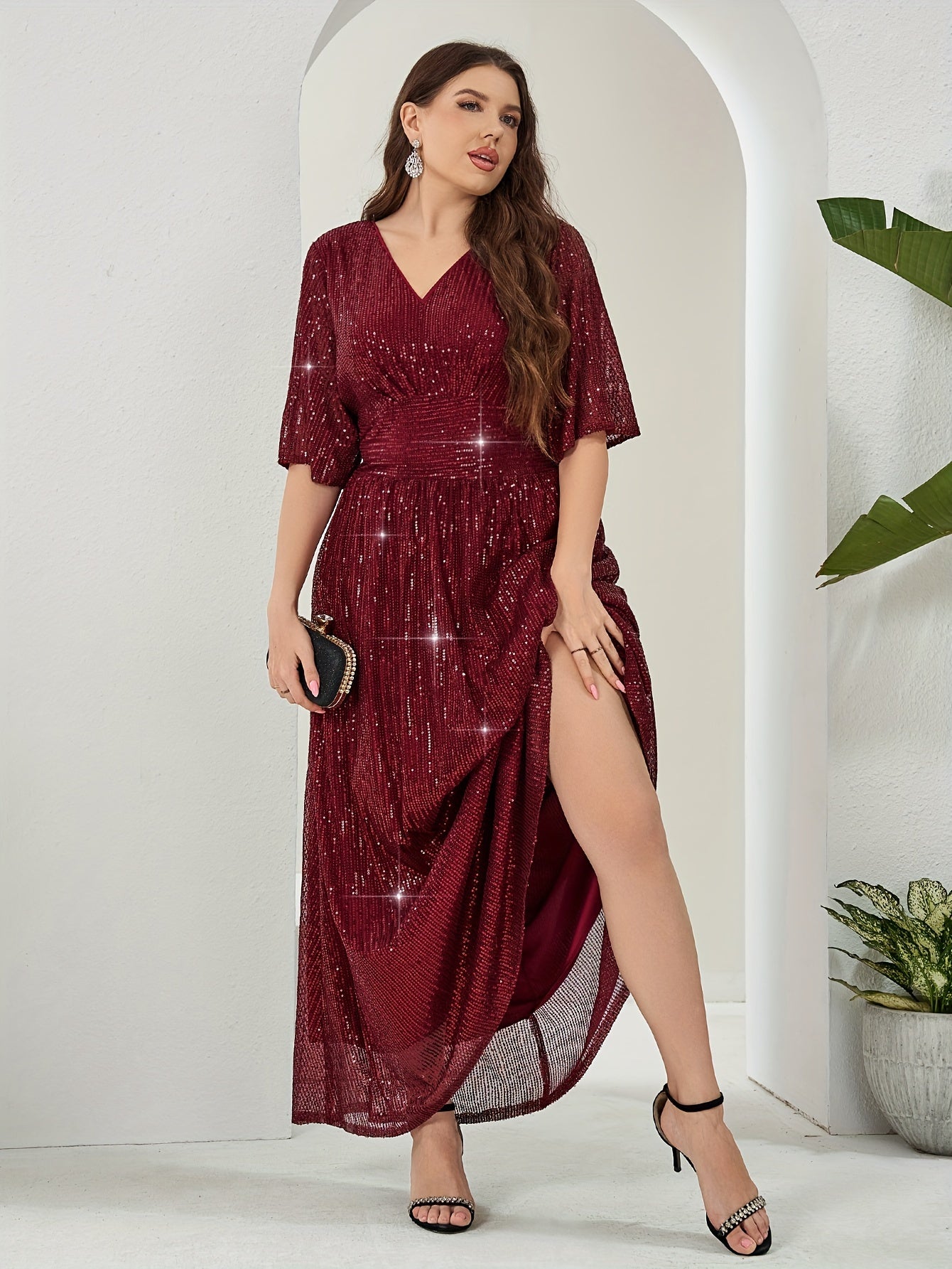 Elegant plus-size sequin maxi dress with v-neck and half sleeves. Made of non-sheer polyester with zip detail. Suitable for all seasons.