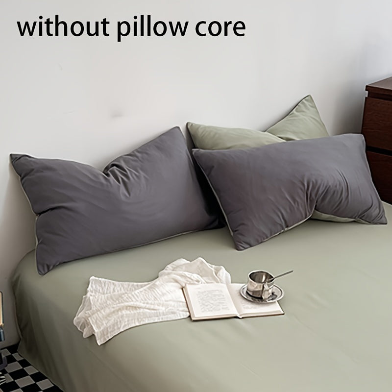 Get two ultra-soft brushed polyester pillowcases, weighing 90g each in a sleek light purple color. These rectangular pillowcases measure 50.8x76.2cm and feature an envelope closure. They are machine washable and perfect for adding cozy comfort to your