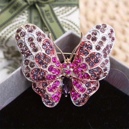 Stylish Rhinestone Butterfly Brooch Pin designed for Women, featuring a Luxurious and Unique Irregular Shape. This Fashion Accessory is perfect for adding a touch of elegance to any outfit. Ideal for Parties or as a special Gift for Couples, this inlaid