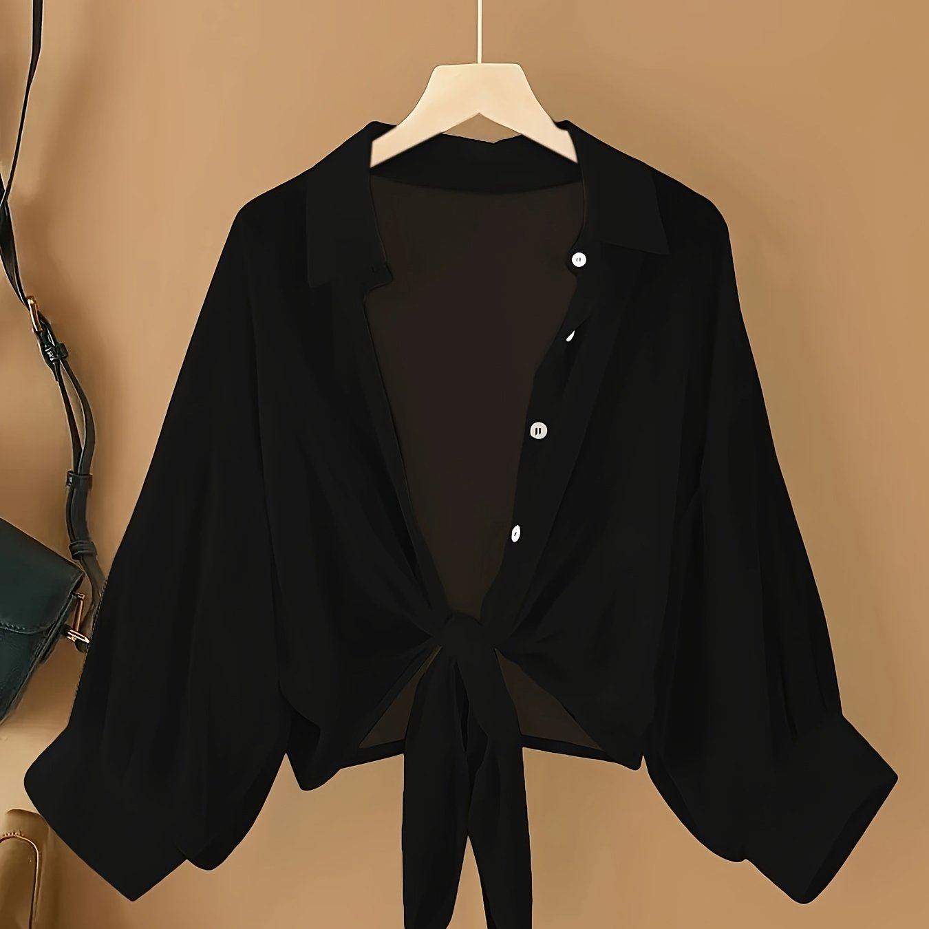 Women's casual chiffon cardigan with front bow detail and lapel collar, suitable for spring/summer/fall.