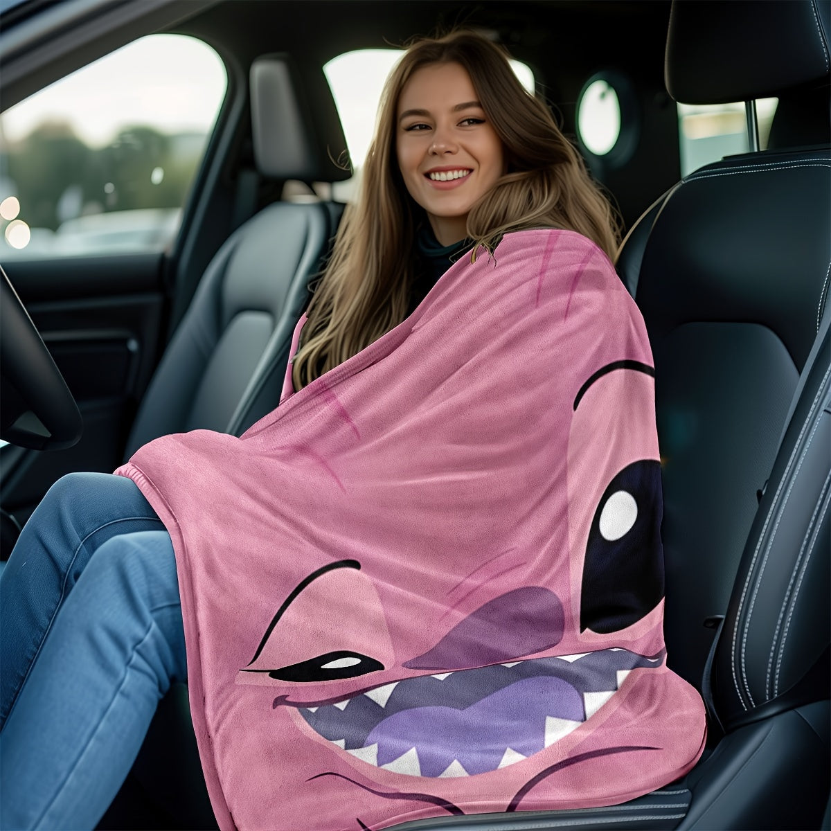 Pink plush throw blanket featuring a contemporary cartoon design. Made from soft polyester knit fabric, this multipurpose bedding is suitable for all seasons. Perfect for adding comfort to your bed, sofa, office nap, or as a travel blanket. Makes an