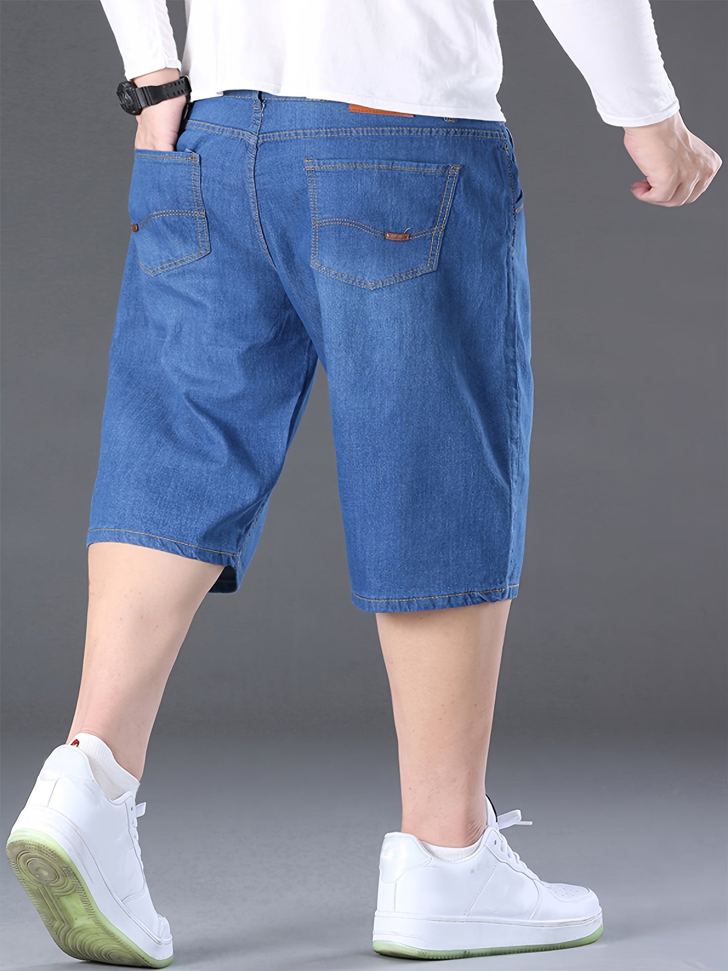 Stylish summer denim shorts for plus-size men in blue.