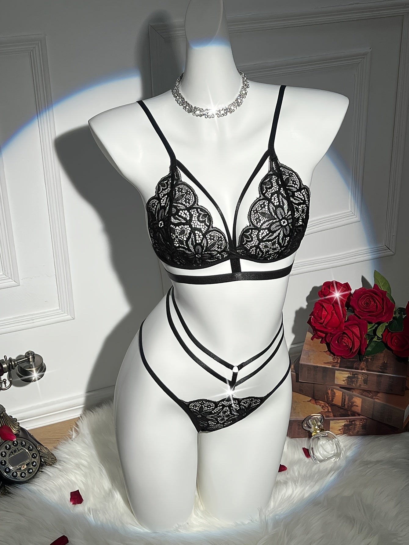 Sexy floral lace lingerie set includes a cut-out push-up bra and strappy thong.