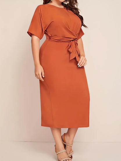 Stylish women's summer dress with bow tie waist, round neck, and short sleeves. Made of lightweight polyester, machine washable. Ideal for casual or formal events.