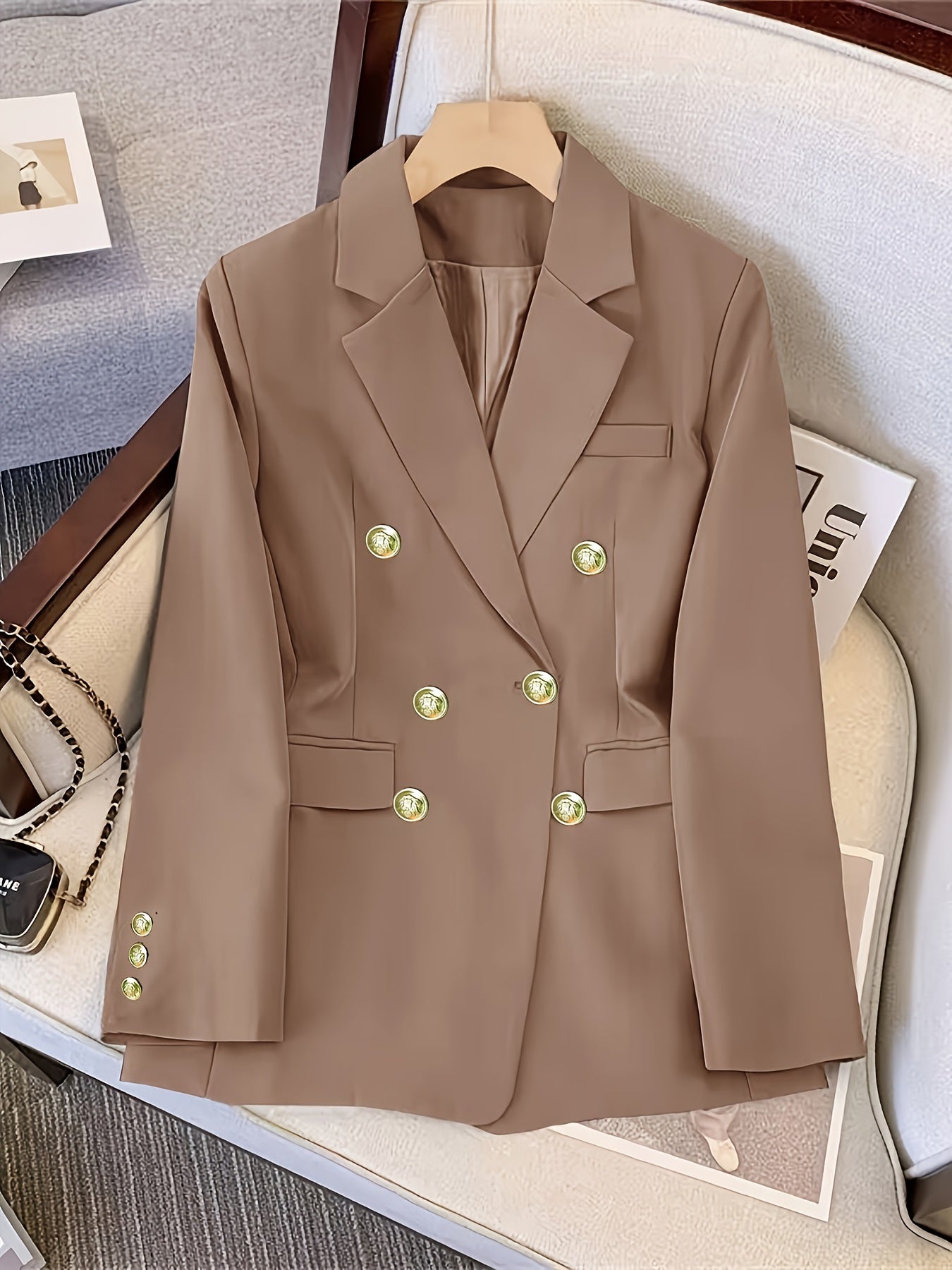 Women's double-breasted blazer with notched lapel for office and work.