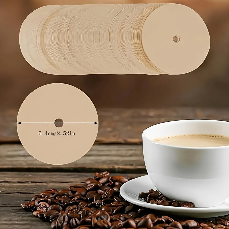 Pack of 100 round coffee filter papers, each paper measuring 6.4cm in diameter. These disposable filter papers are perfect for use in drip filters, camping coffee pots, RVs, outdoor camping, picnics, offices, and while traveling.