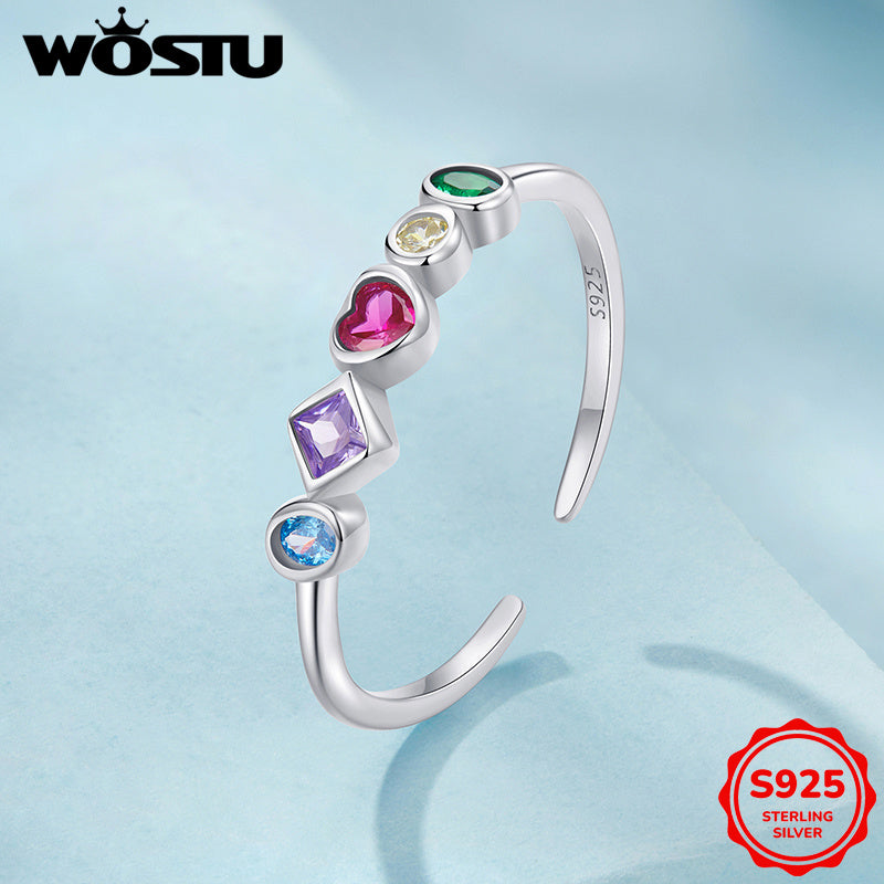 This open ring for women showcases a vibrant heart design reminiscent of Japanese and Korean Y2K styles. Crafted from 925 silver and adorned with synthetic zirconia, it weighs 2.5G. Ideal for daily wear or as a thoughtful gift for a girlfriend, partner