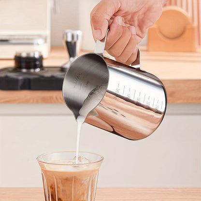 The Stainless Steel Coffee Art Cup is perfect for creating beautiful latte art, cappuccinos, and iced teas. Featuring convenient measurement marks and a large capacity, this milk frothing pitcher is available in 350ml, 600ml, and 900ml sizes.