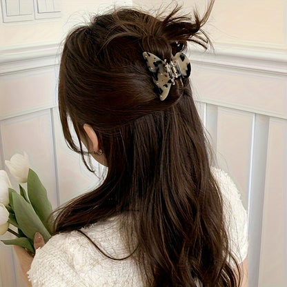 Princess top clip with rhinestone details for half-braided ponytails.