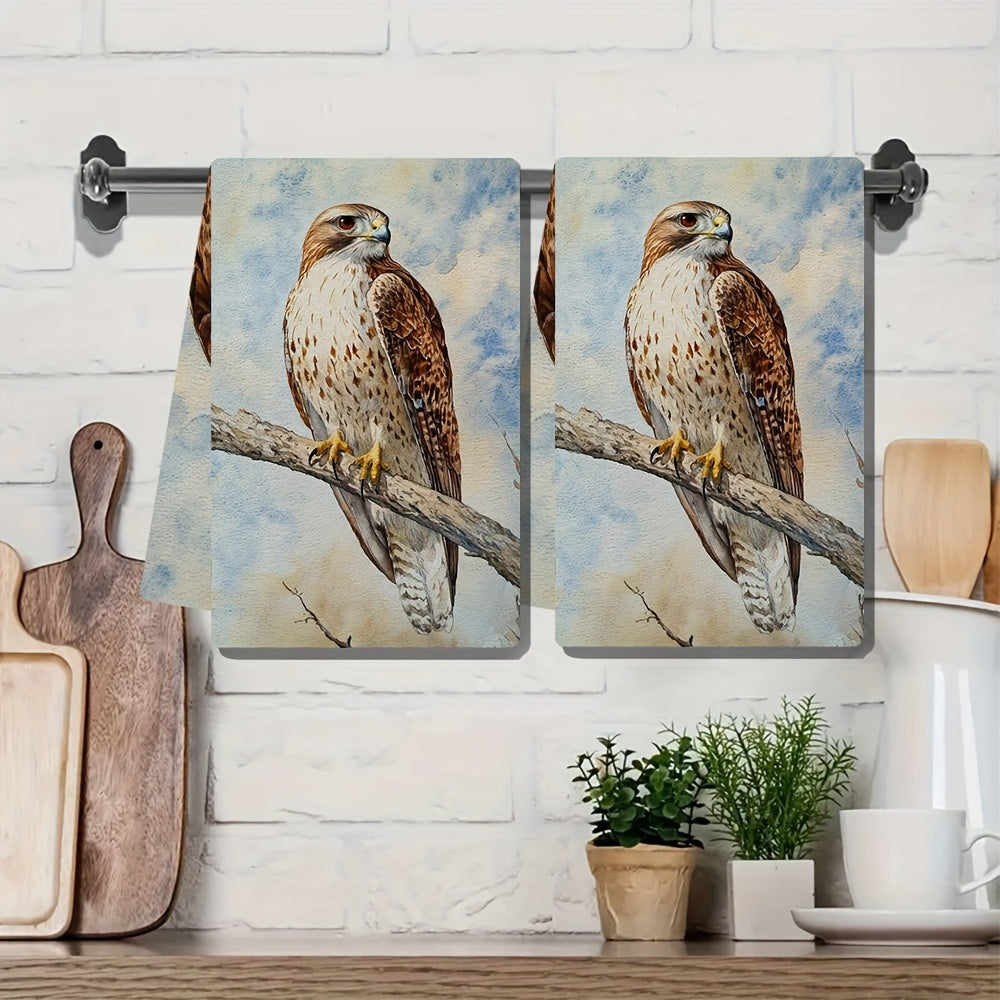 Two pieces of ultra-soft kitchen towels featuring a hawk perched on a branch design. These highly absorbent towels are machine washable and perfect for drying dishes or hands. Add a touch of contemporary coastal decor to your kitchen with these towels