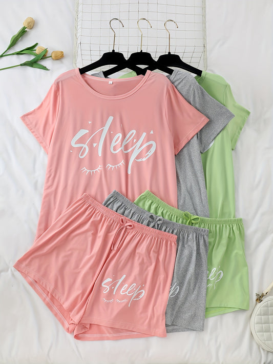 Women's 3-piece pajama set featuring alphabet print, polyester knit fabric with stretch, color block short sleeve top and shorts. Perfect for fall season lounging at home.