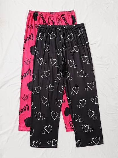 Two cozy plus size sleep pants made from polyester knit fabric with slight stretch. Features an all-season love heart pattern and bow detail.