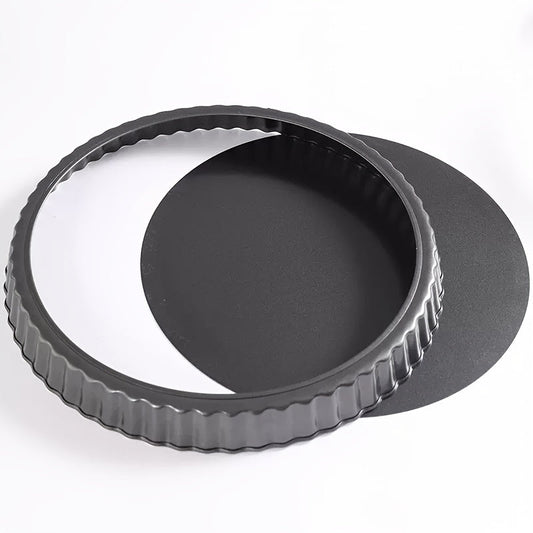 One piece of a round, black baking pan with a removable metal bottom and non-stick coating, perfect for baking pies, cakes, or cheese. Ideal for kitchen tools.