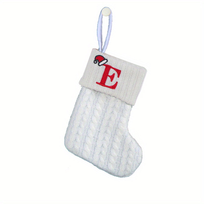 White cable knit stocking with embroidered 'F' - Ideal for indoor decor.