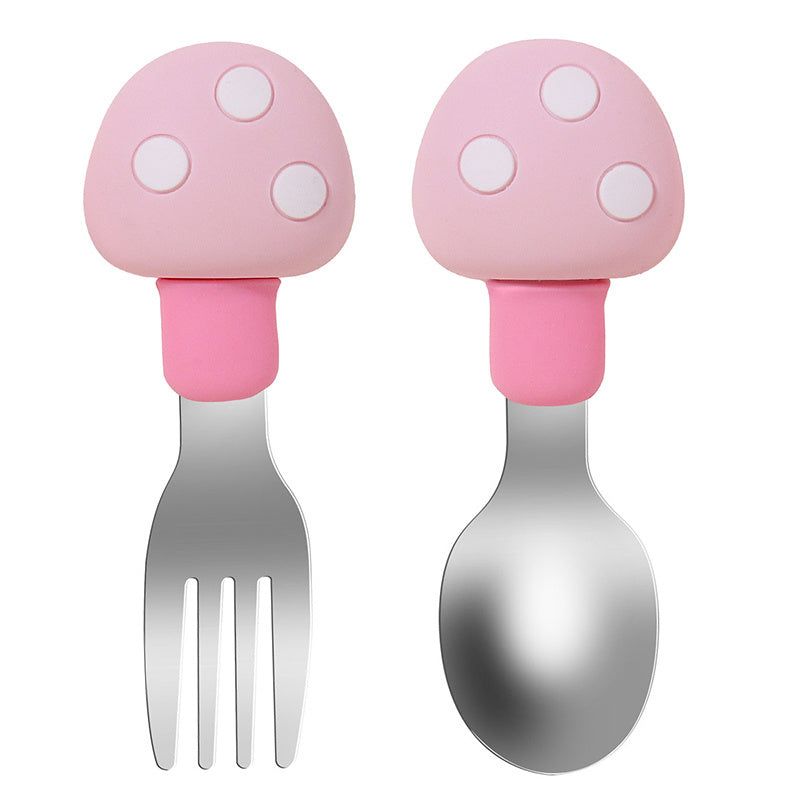 Set of feeding utensils for babies made of silicone and featuring a mushroom design. Includes a spoon and fork.