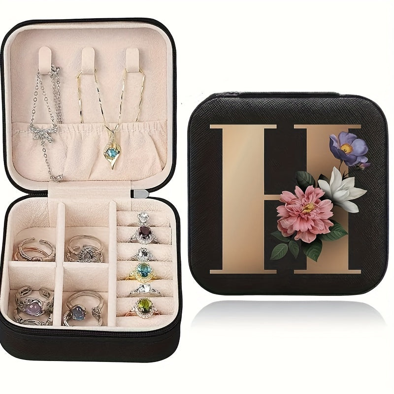 Floral initial jewelry organizer box with compact design, soft velvet lining, durable zipper, and lightweight, ideal for jewelry organization and travel.