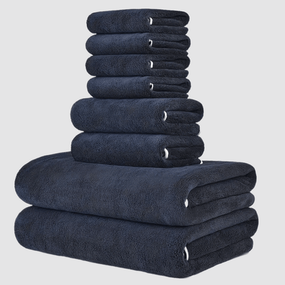 This 8-piece set includes 2 bath towels (68.58 X 139.7 cm), 2 towels (34.8 X 74.93 cm), and 4 square towels (29.97 X 29.97 cm). They are super soft, quick-drying, absorbent, and