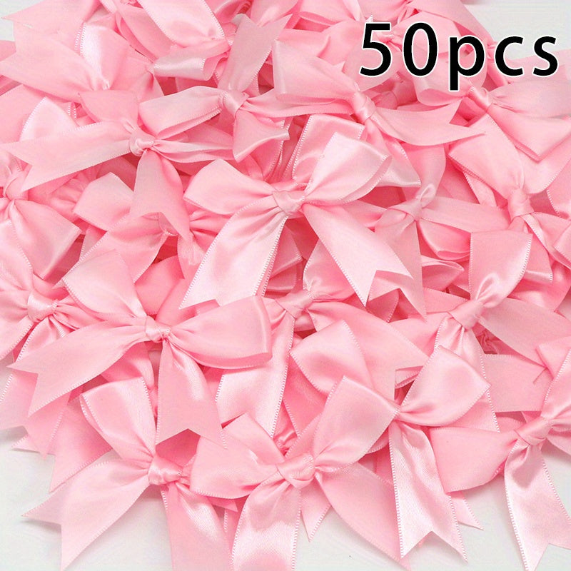 50 pieces of small pink and white satin ribbon bows measuring 8.38cm x 8.38cm for DIY crafting, gift tying, wedding decorations, and baking.