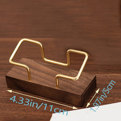 Walnut wood business card holder for desk display and organization.