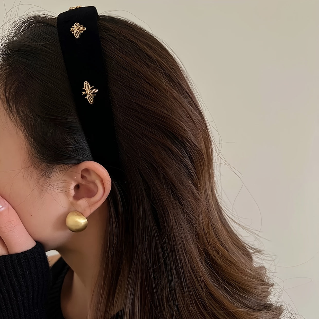 Stylish black velvet headband with golden bee embellishments, perfect for women on Valentine's Day.