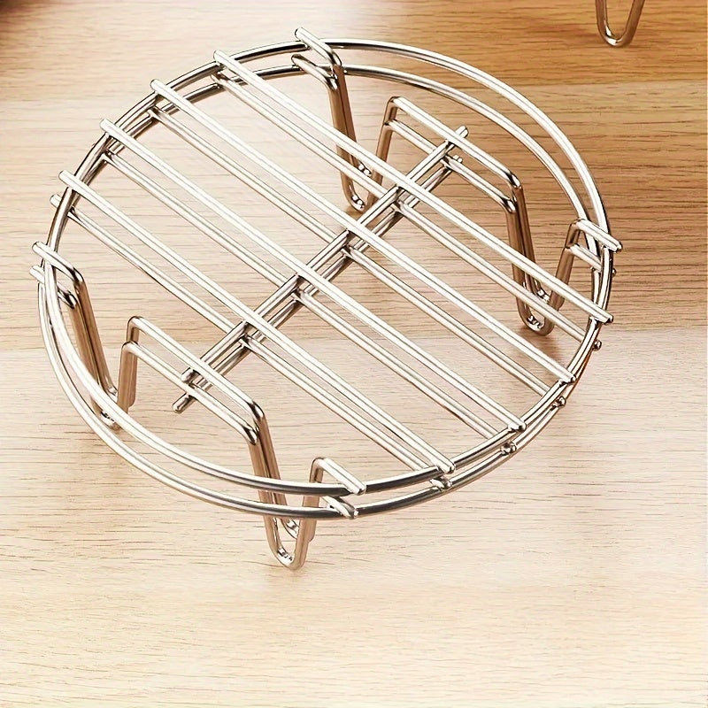 Two pieces of stainless steel steamer racks with an elevated 4-corner design, perfect for healthy cooking and essential kitchen accessories.