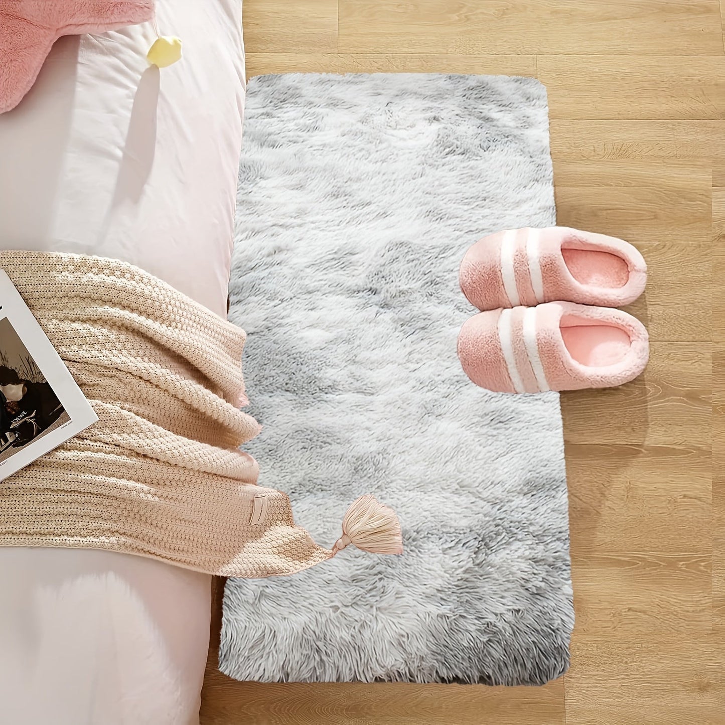 Soft and fluffy rectangle area rug perfect for your bedroom. This plush carpet is thick and non-slip, making it ideal for your living room. Made with machine-made polyester fiber, this low-pile rug is washable for easy cleaning. Perfect for indoor use.