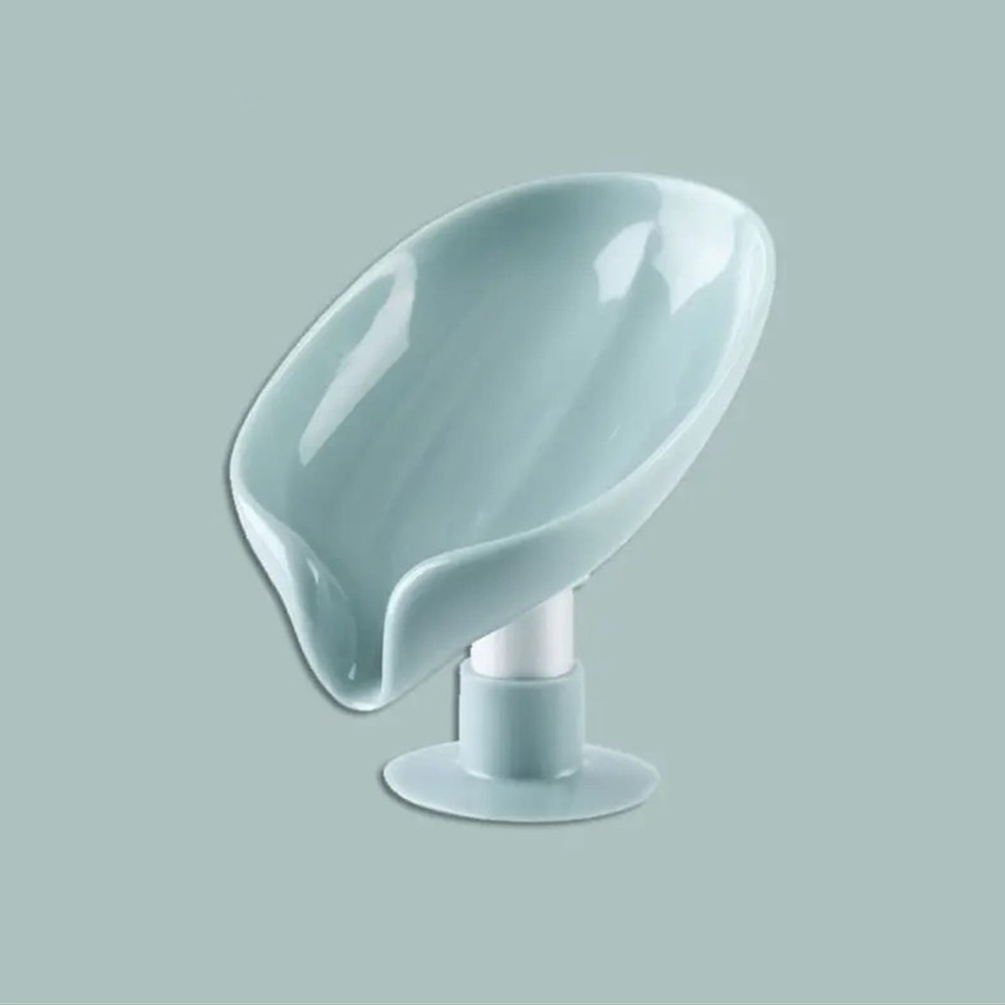 Leaf-shaped soap dish with strong suction and drainage in green/gray color, does not require electricity, enhances bathroom decor, keeps soap dry.