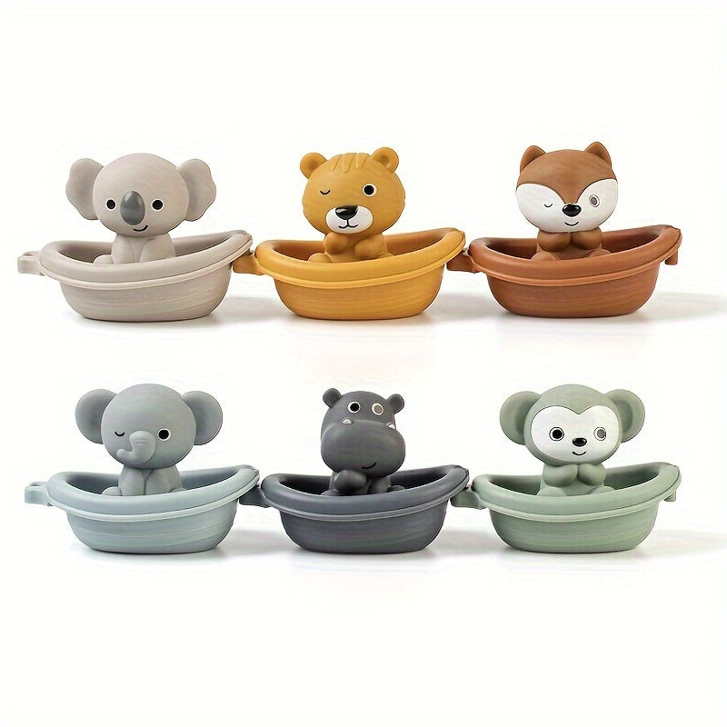 Floating boat toy for the bath, featuring animal finger covers for young children to play with in the water. Stackable and fun for youngsters.