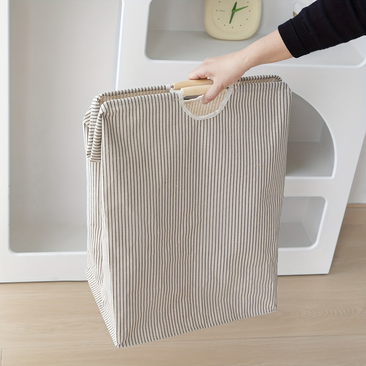 Fold and store your laundry easily with this 1-piece collapsible laundry basket. Featuring handles for easy transportation, this large hamper is perfect for storing clothes, towels, and toys in your family or dorm. Keep your bathroom, bedroom, or laundry