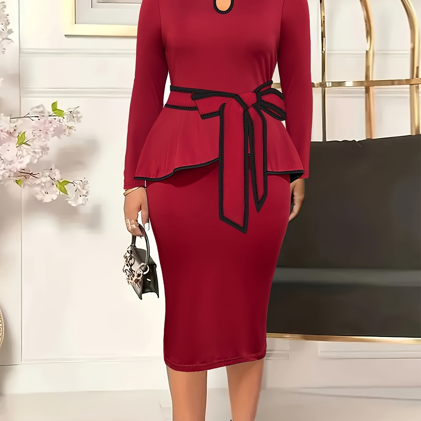 Plus size peplum dress in solid color with round neck and contrast trim, made from polyester blend stretch knit for all-season wear in a fitted style.