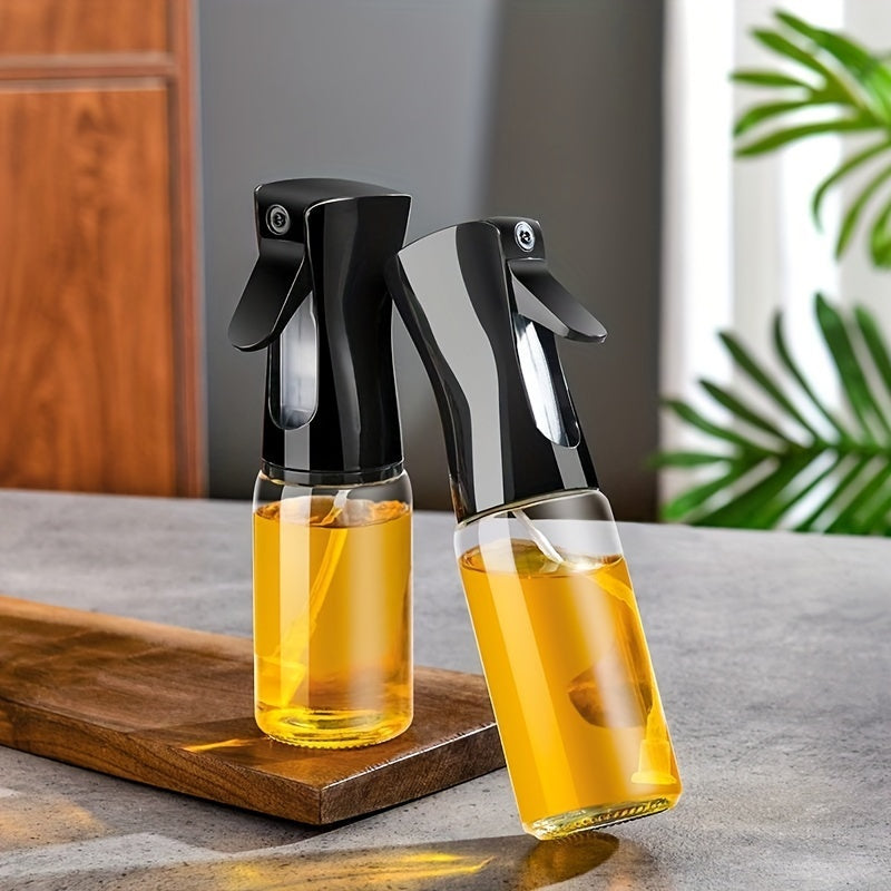 Oil spray bottle for home use, ideal for cooking, suitable for various uses in the kitchen.