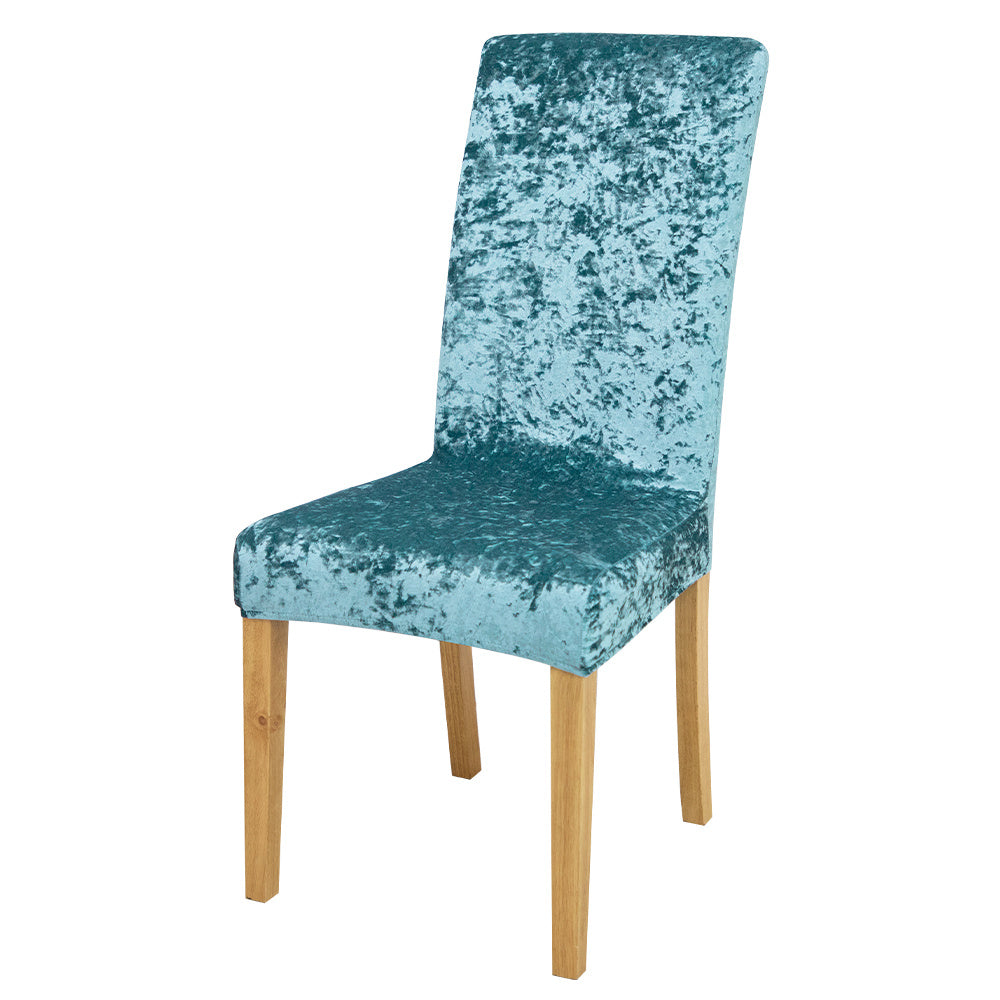 Velvet dining chair slipcovers add elegance while protecting furniture.