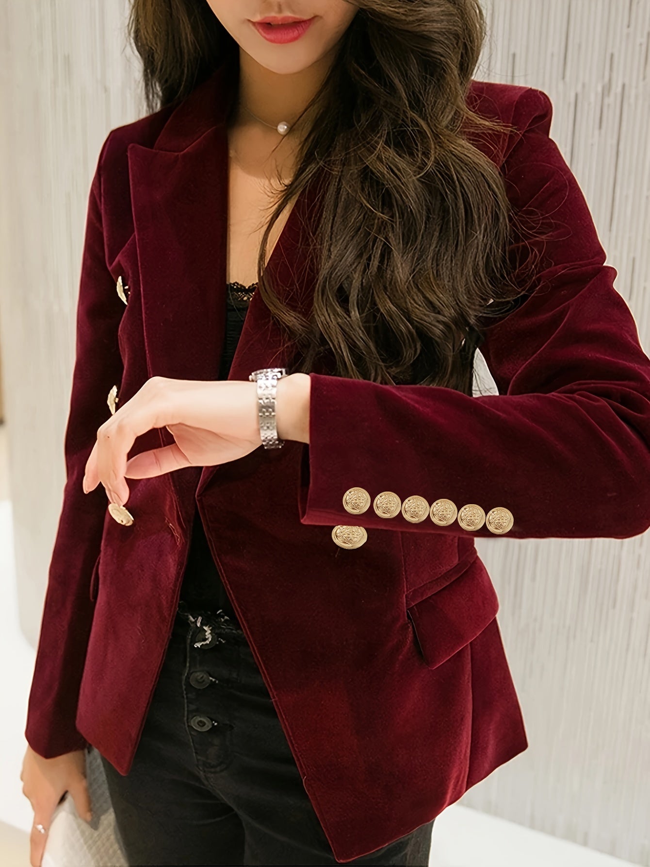 Elegant velvet pea coat for women with double-breasted design, button detail, and long sleeves in solid color.